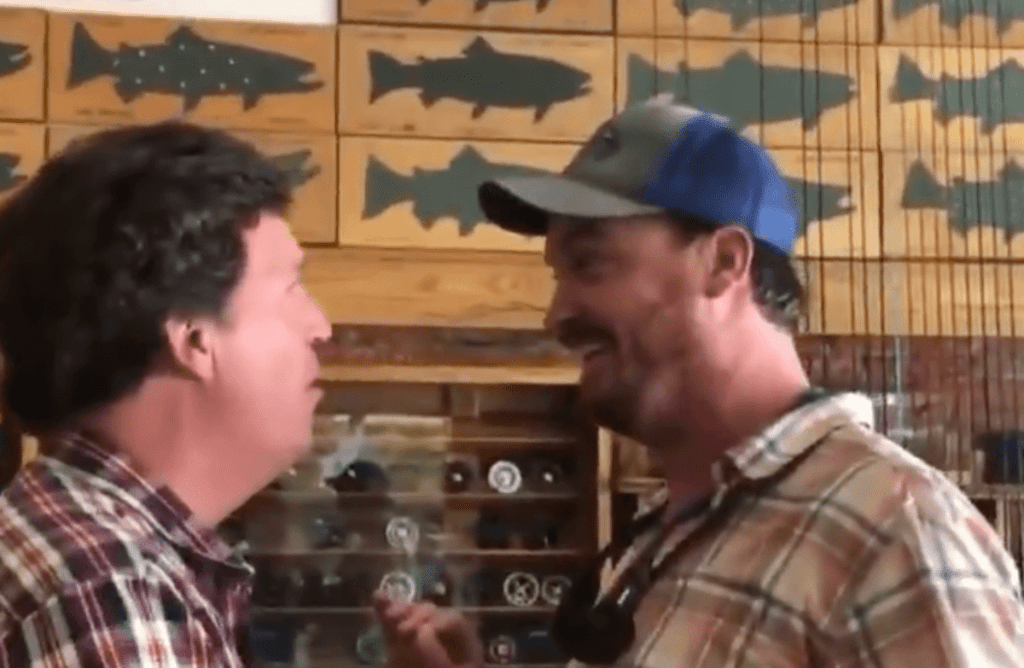 man confronts tucker carlson in fly fishing store montana