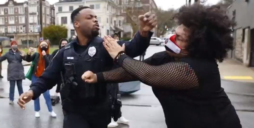 BLM takes left hook from police officer