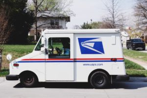 white usps mail truck in santa monica california