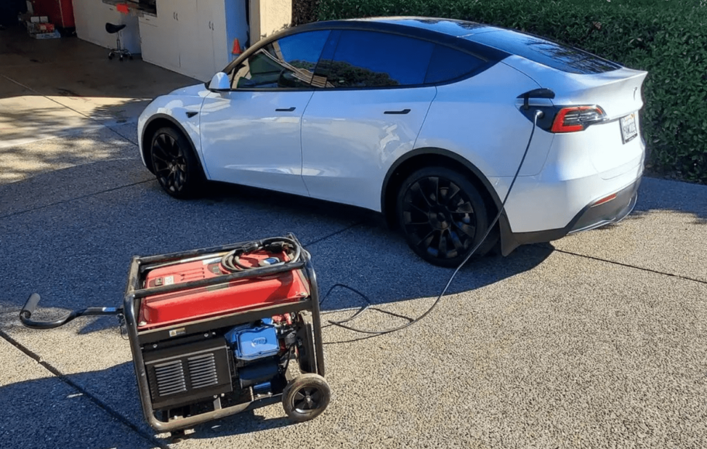 gas generator charges a tesla in a California driveway